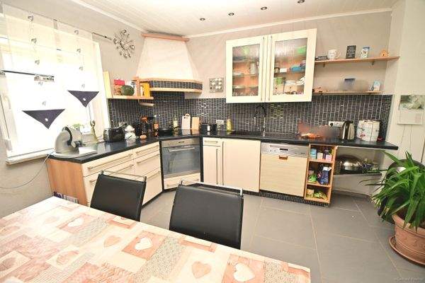 gemütliche Wohnküche als familiäres Zentrum (Haupthaus/Erdgeschoss)