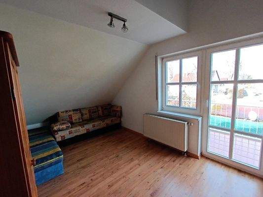 Zimmer mit Balkonzugang