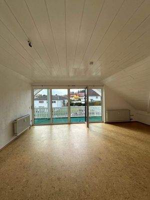 Wohnzimmer mit Sicht auf Loggia