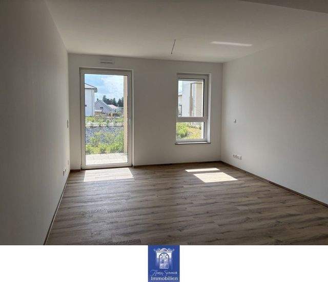 Rollstuhlgerechte Wohnung mit Fußbodenheizung, edlem Bad, moderner EBK, Terrasse! - Foto 1