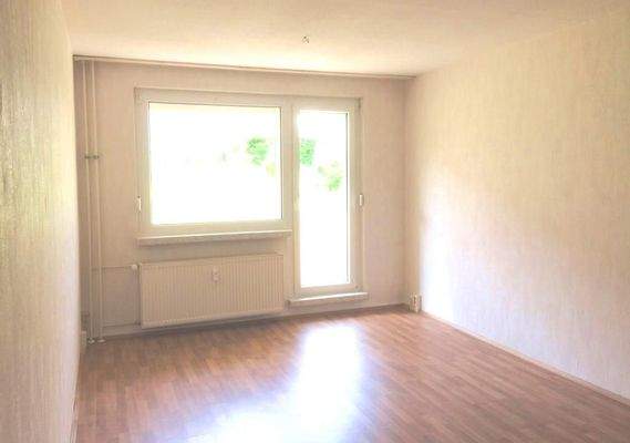 Wohnzimmer mit Balkon