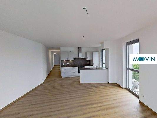 Ansicht V: Wohn- und Esszimmer mit offenem Küchenbereich