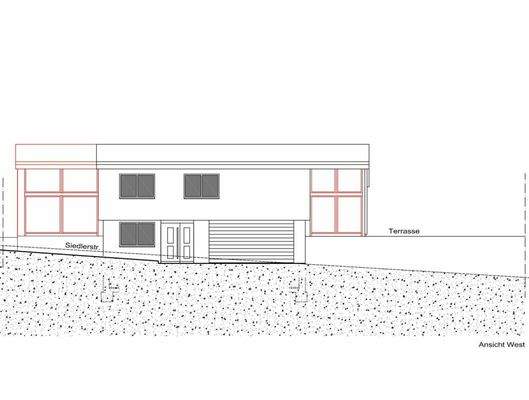 Westfassade mit Garagen und Terrasse