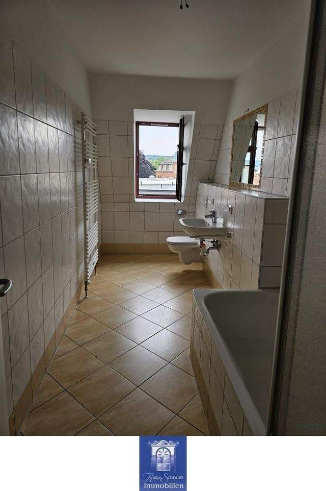 Beeindruckende Dachwohnung mit großer Küche und optimaler Raumaufteilung! - Foto 2