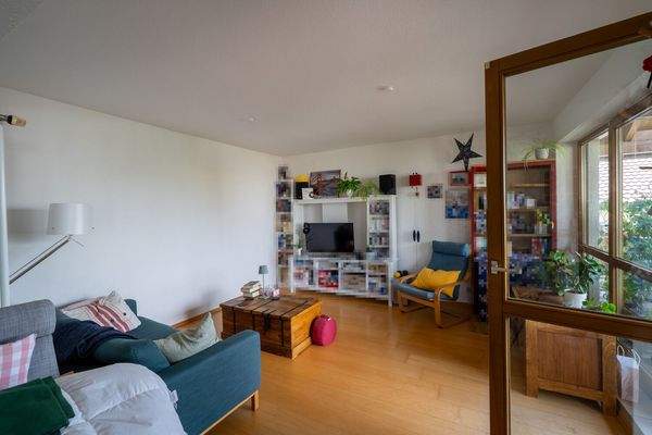 OG - Wohnzimmer mit Balkonzugang