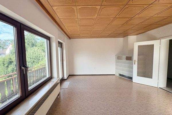 Wohnzimmer mit Kachelofen - OG