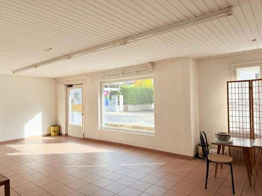 Geschäftslokal EG Wohnhaus