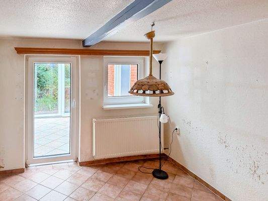 Kaminzimmer Ausblick in den Wintergarten