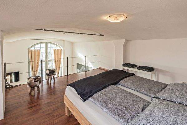 Obere Schlafebene mit Doppelbett