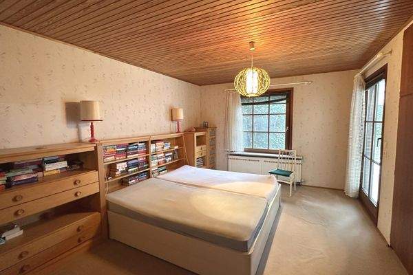 Schlafzimmer EG mit Zugang zum Wintergarten