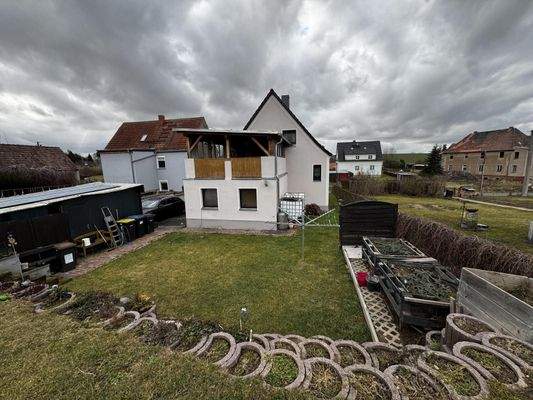 Ansicht Garten + Wohnhaus + Nebengebäude