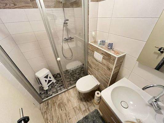 Bad mit ebener Dusche Bild 1