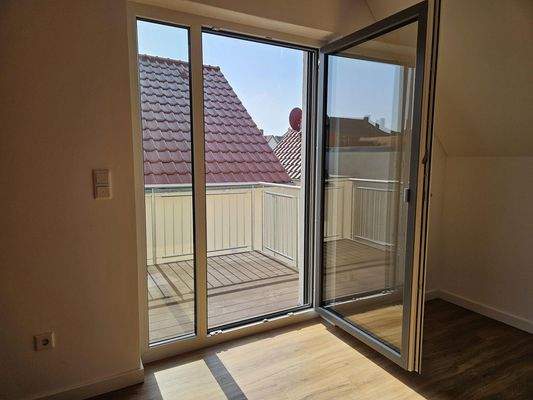 Vom Wohnzimmer auf den Balkon