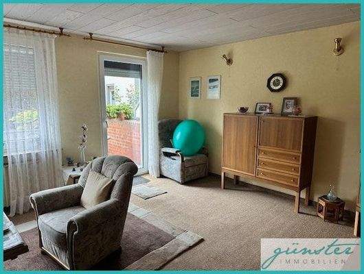 Wohnzimmer mit Balkon