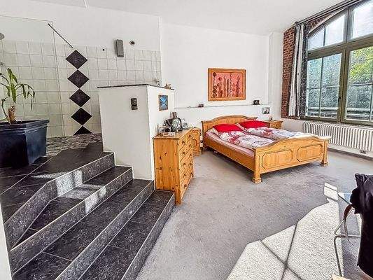 Schlafzimmer mit Badezimmer