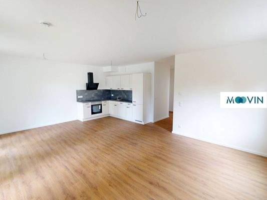 Ansicht IV: Wohn- und Esszimmer mit offenem Küchenbereich