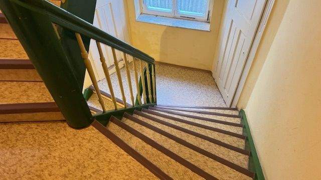 Treppenhaus EG zu den Wohnbereichen