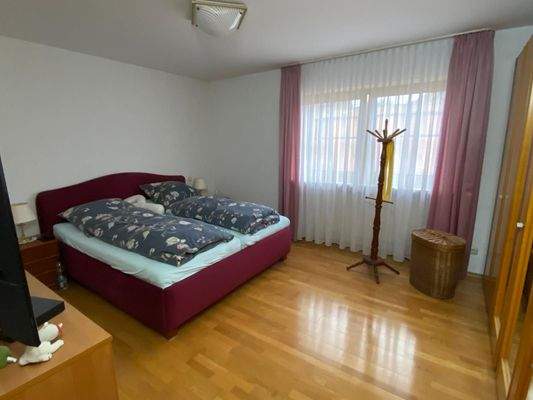 Schlafzimmer in Wohnung 1