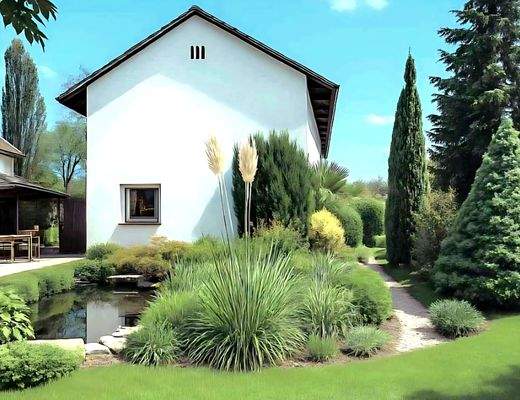 Garten mit Koiteich und Gartenhaus 
Süd / West, linke Haushälfte Nr.40