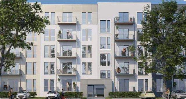 Schicke 2-Zimmerwohnung mit Parkett, Balkon, Einbauküche u. Fußbodenheizung - Photo 4