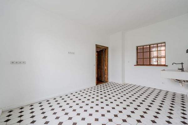 Kitchen with historic serving hatch