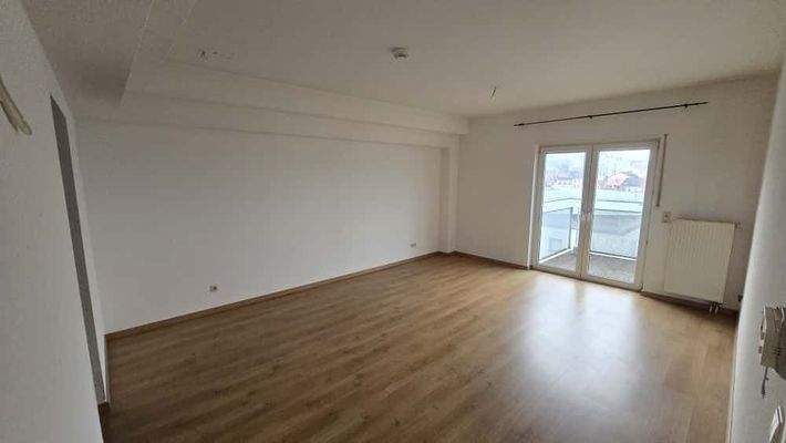 Wohnzimmer mit Balkon