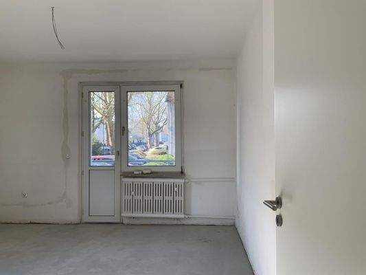 Wohnzimmer mit Balkon