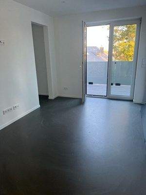 Schlafzimmer mit Zugang zum Balkon