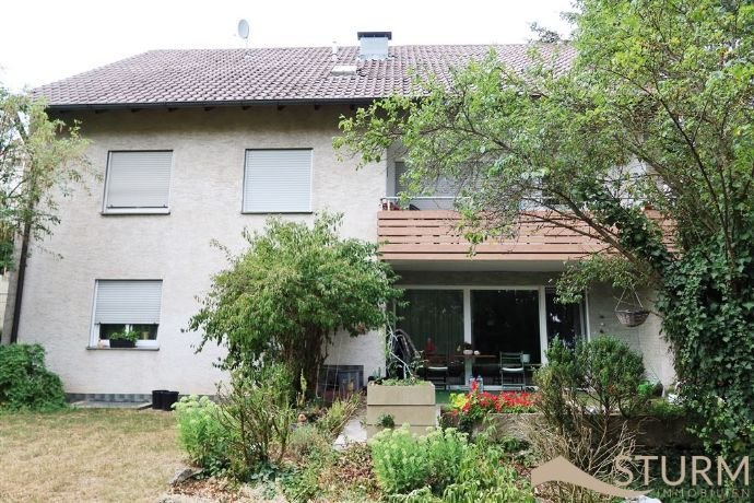 Mehrfamilienhaus mit Nebengebäude und Garten - Zentral in Rimpar