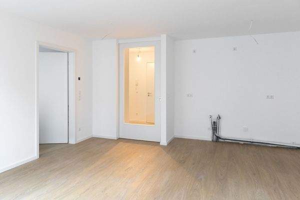 Wohnzimmer mit Küchenanschlüssen