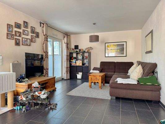 Wohnbereich mit Zugang zum Sommergarten