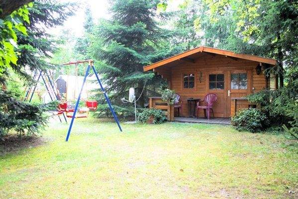 Blockbohlenhaus mit TV-Anlage