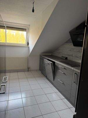 Küche mit Einbaucküche