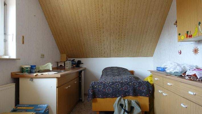 Schlafzimmer 3 OG/ Küche