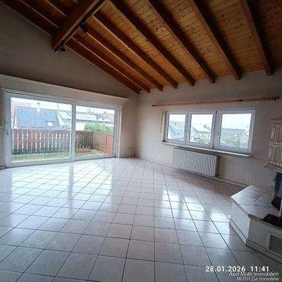 Wohnzimmer mit Kamin