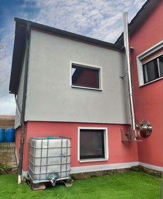 Garage mit Unterkellerung, Edelstahlkamin EG Wohnhaus