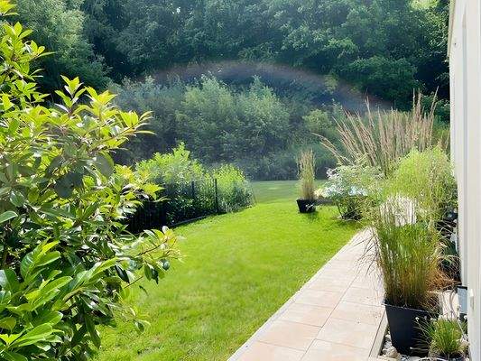 Austritt aus der Wohnung über den Balkon zum exklusiven Gartenanteil