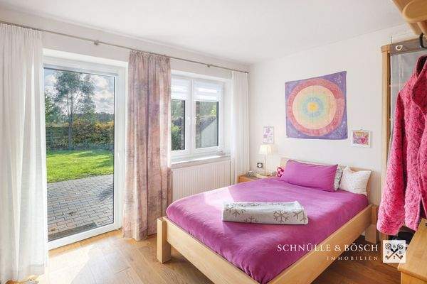 Ein Schlafzimmer mit eigenem Terrassenzugang