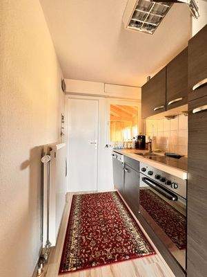 Küche mit Einbauküche im OG