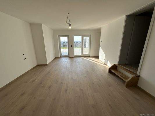 Schlafzimmer mit Aufgang zum Badezimmer