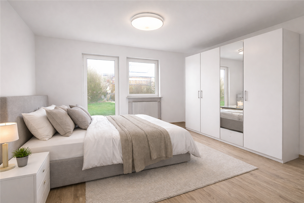 Modernes Schlafzimmer mit Zugang in den Garten