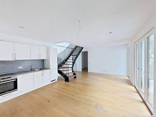 Ansicht I: Wohn- und Esszimmer mit offenem Küchenbereich