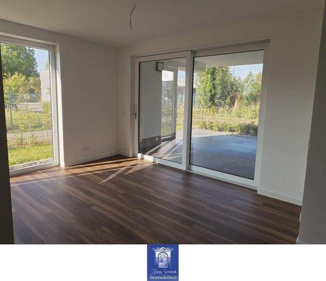 Ihr neuer Wohntraum im attraktiven Neubau, große Terrasse, ruhige Lage mit viel Grün! - Photo 1