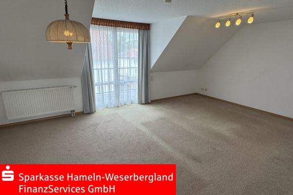 Wohnzimmer mit Balkon
