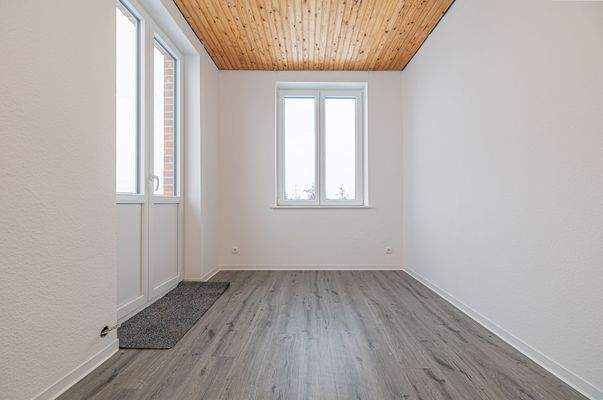 Wohnzimmer mit Balkonausgang