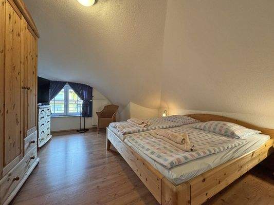 Schlafzimmer 2 im Dachgeschoss