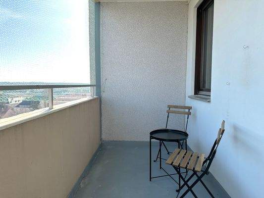 Balkon mit Sitzgelegenheit