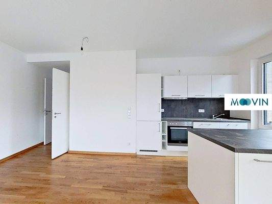 Ansicht VI: Wohn- und Esszimmer mit offenem Küchenbereich