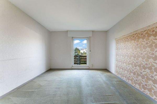 Schlafzimmer mit Balkonzugang