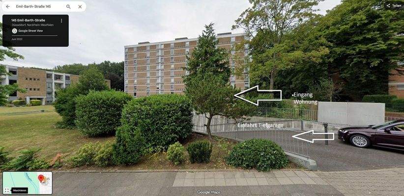 Haus mit Tiefgaragenzufahrt